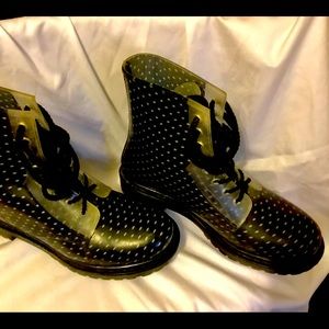 Lace up fall rain boots.